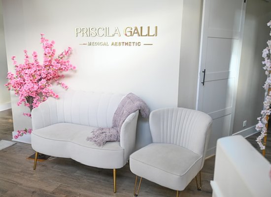 Ella Beauty studio waiting area with elegant decor